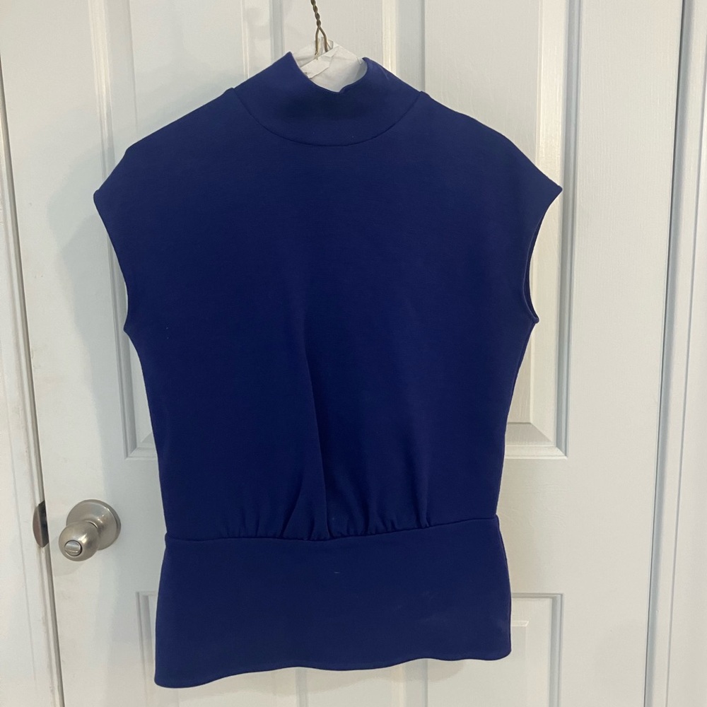 blue sleevless sweater with back zipper